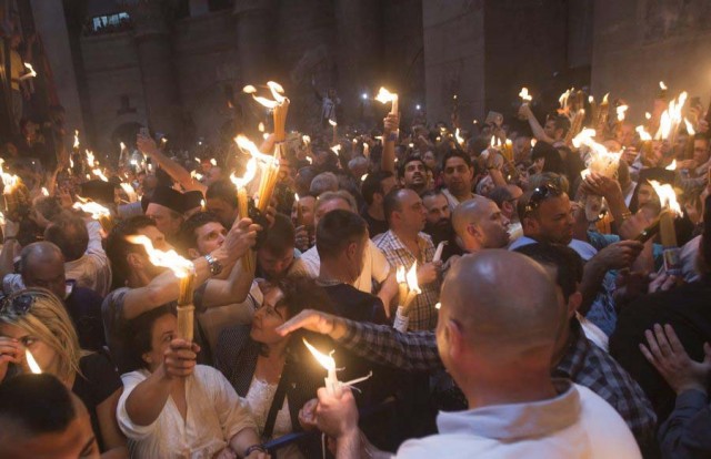 Miracle of the Holy Fire in the Church of the Holy Sepulchre in Jerusalem the day before Orthodox Easter