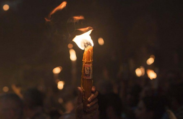 Miracle of the Holy Fire in the Church of the Holy Sepulchre in Jerusalem the day before Orthodox Easter