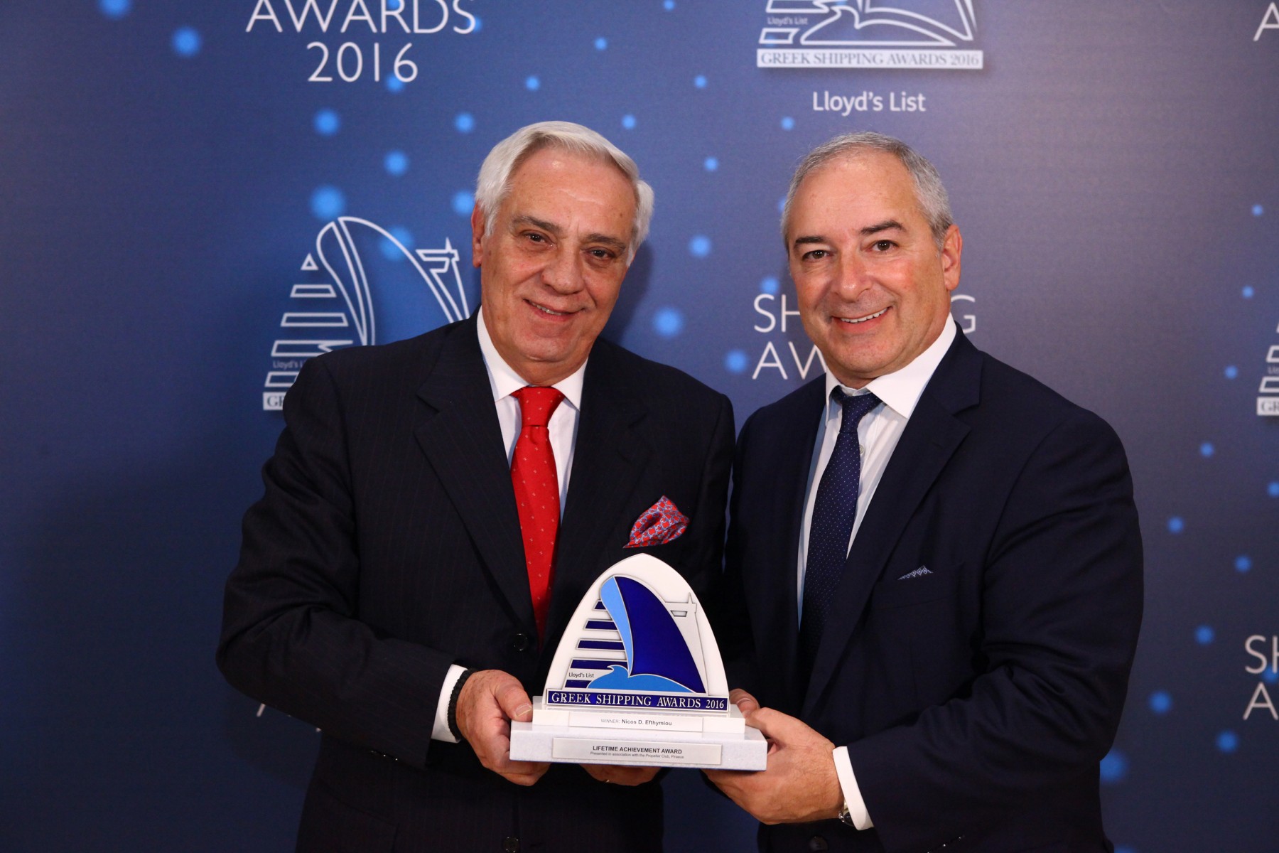 19Mr. Nicos D. Efthymiou receiving the Lloyd’s List/Propeller Club Lifetime Achievement Award from Mr. Vassilis Kroustallis of sponsor ABS