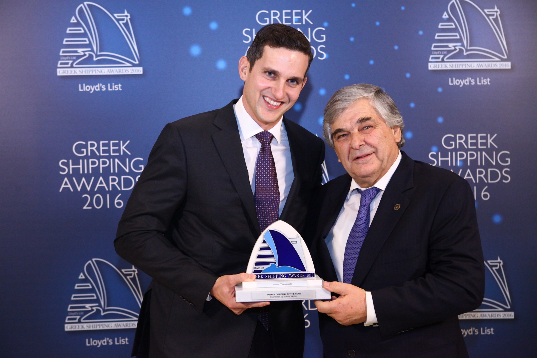 Mr. Nikolas Martinos of Thenamaris accepting the Tanker Company of the Year Award from Mr. Lambros Chahalis of sponsor Bureau Veritas.