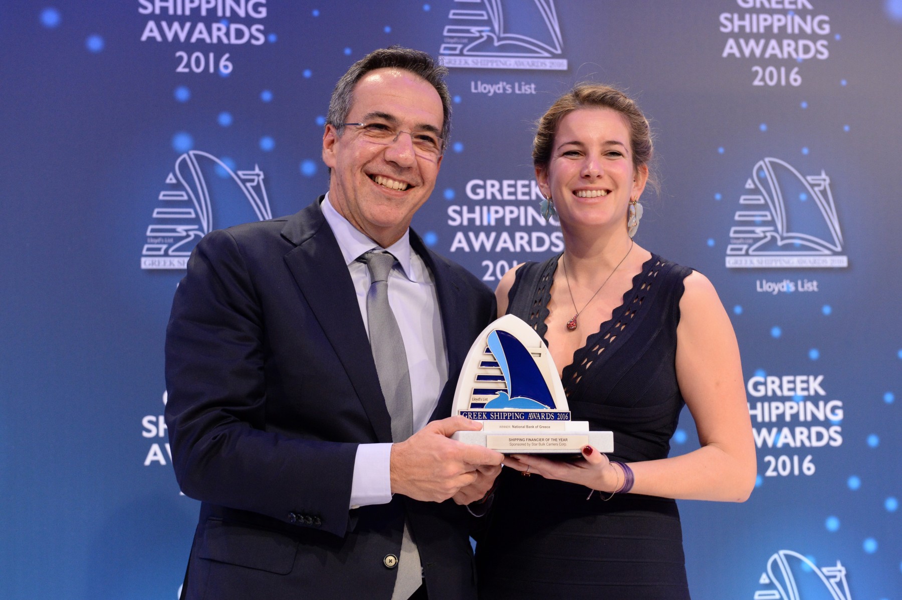  Mr. Leonidas Fragkiadakis of National Bank of Greece accepting the Shipping Financier of the Year Award from Ms. Milena Pappas of sponsor Star Bulk Carriers Corporation 