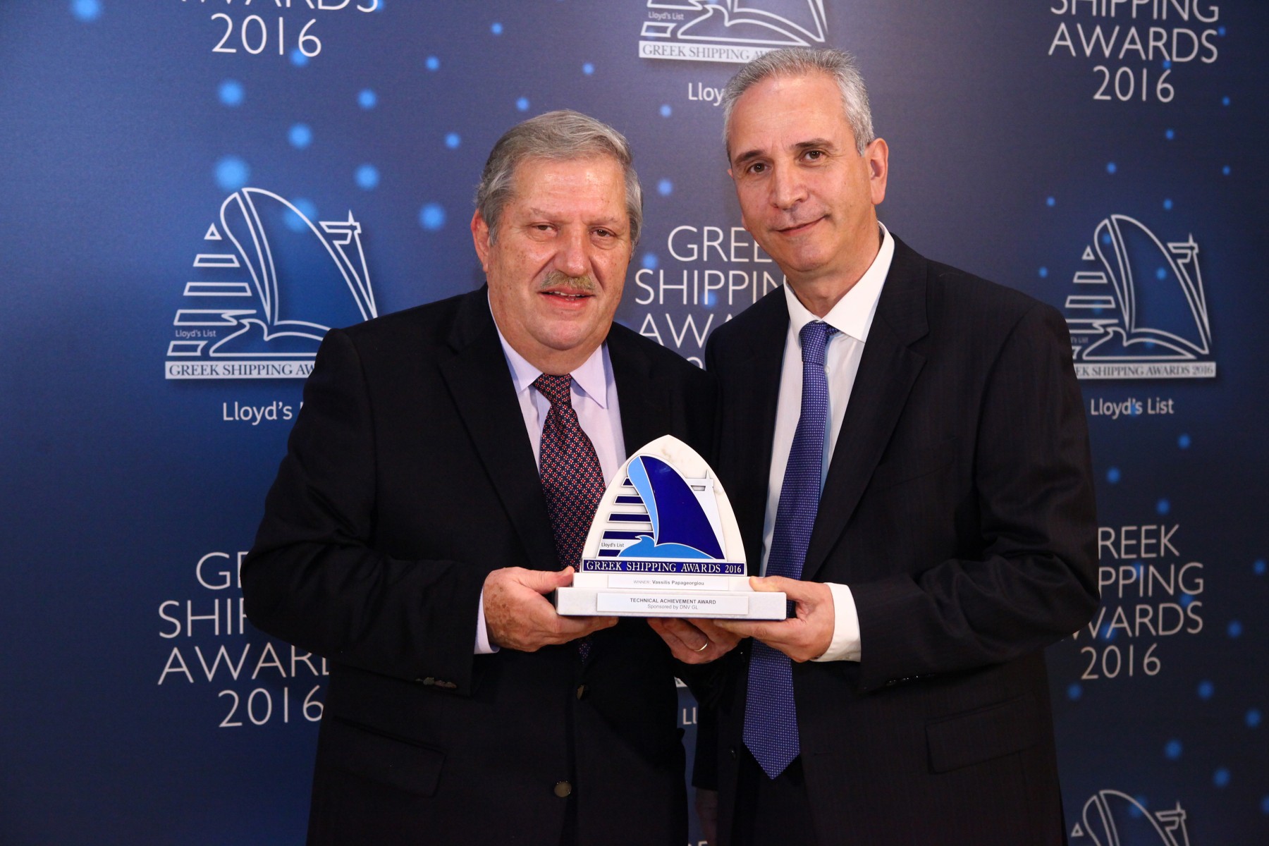 Mr. Vassilios Papageorgiou accepting the Technical Achievement Award from Mr. Loizos Isaias of sponsor DNV GL.