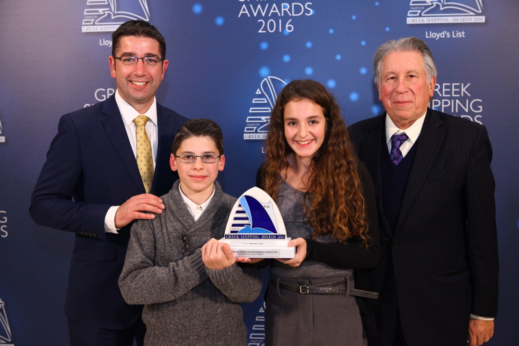 Mr. Nick Brown of sponsor Lloyd’s Register with Constantinos Kolovos and Olympia Zisi of Helmepa Junior with Mr. George Gratsos of Helmepa, receiving the Award for Achievement in Safety or Environmental Protection. 