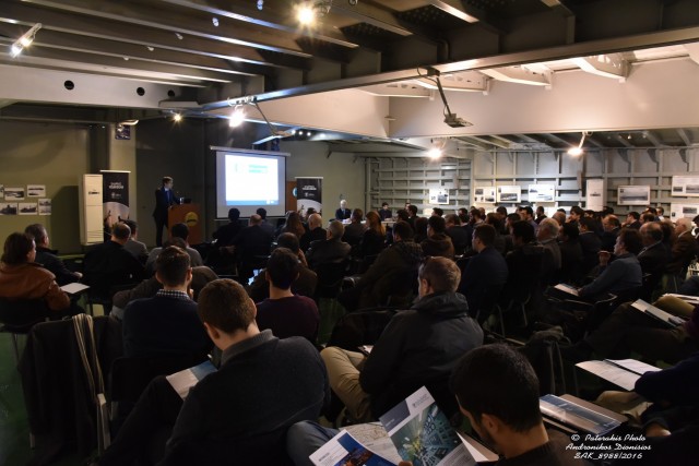 Mr. Alessandro Pescetto on the podium-overview of the seminar hall. 